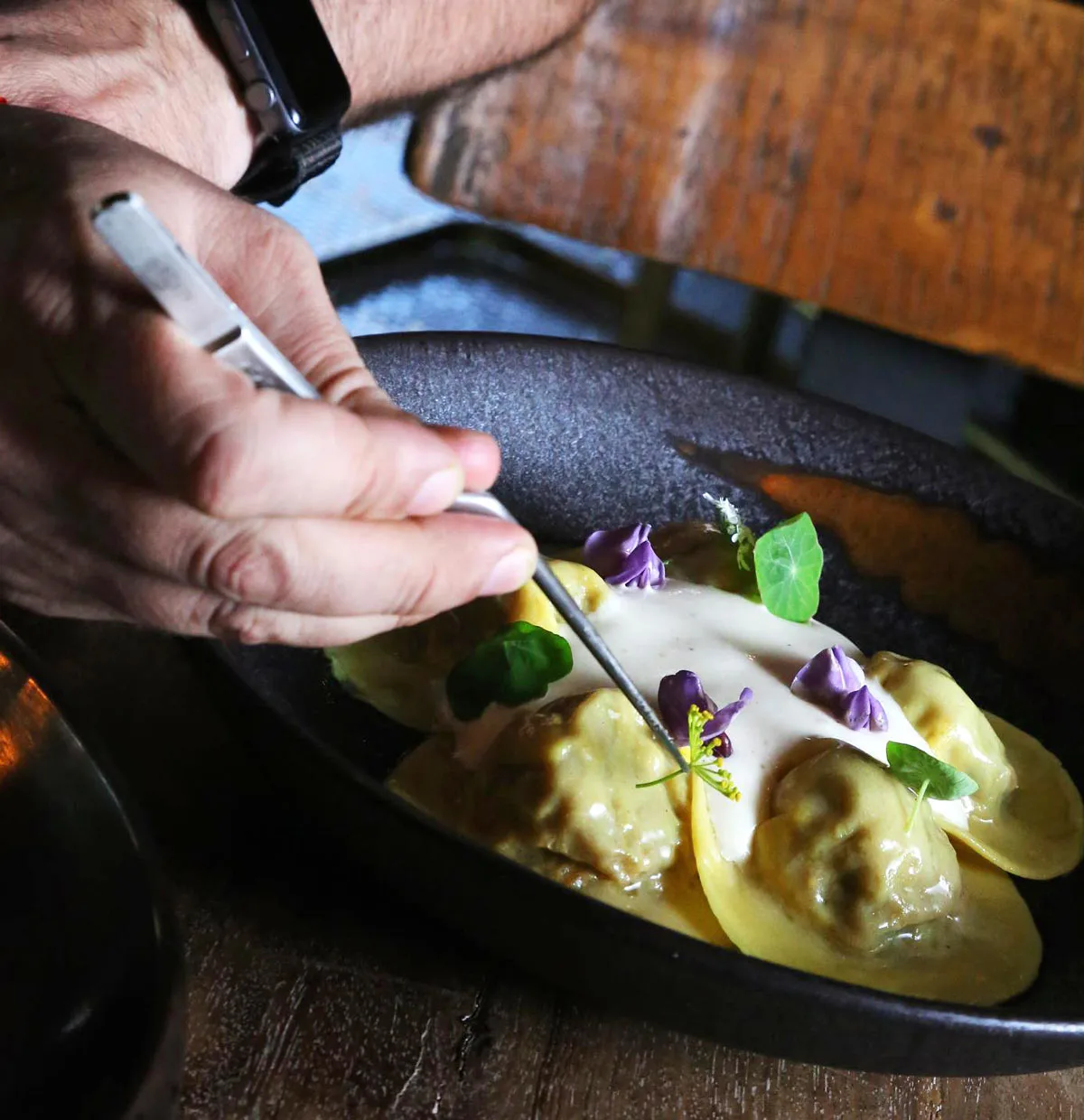 Putting the finishing touches onto a cappelletti dish at Romeo & Julieta, Cabo San Lucas