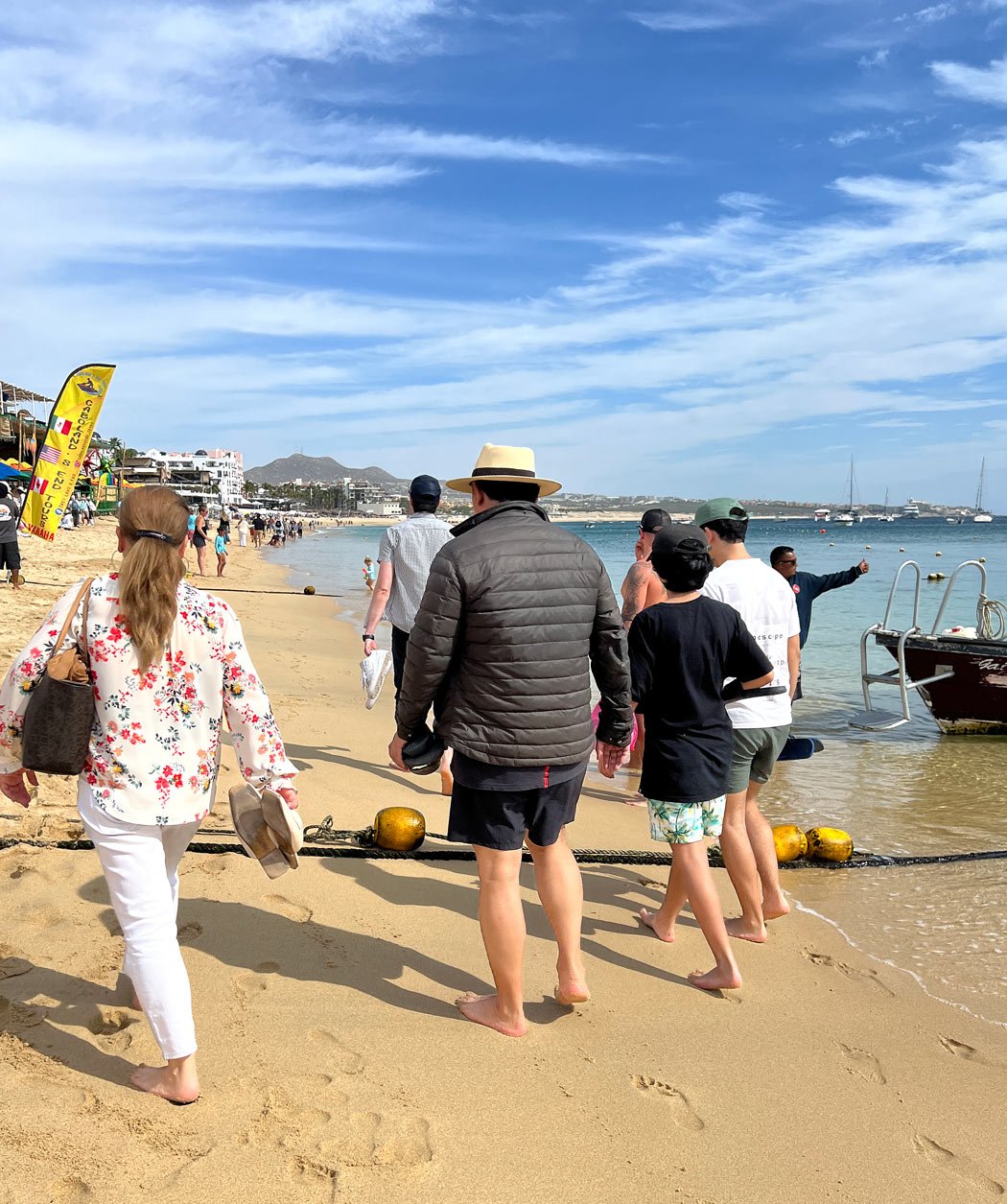 People walking Medano Beach in January