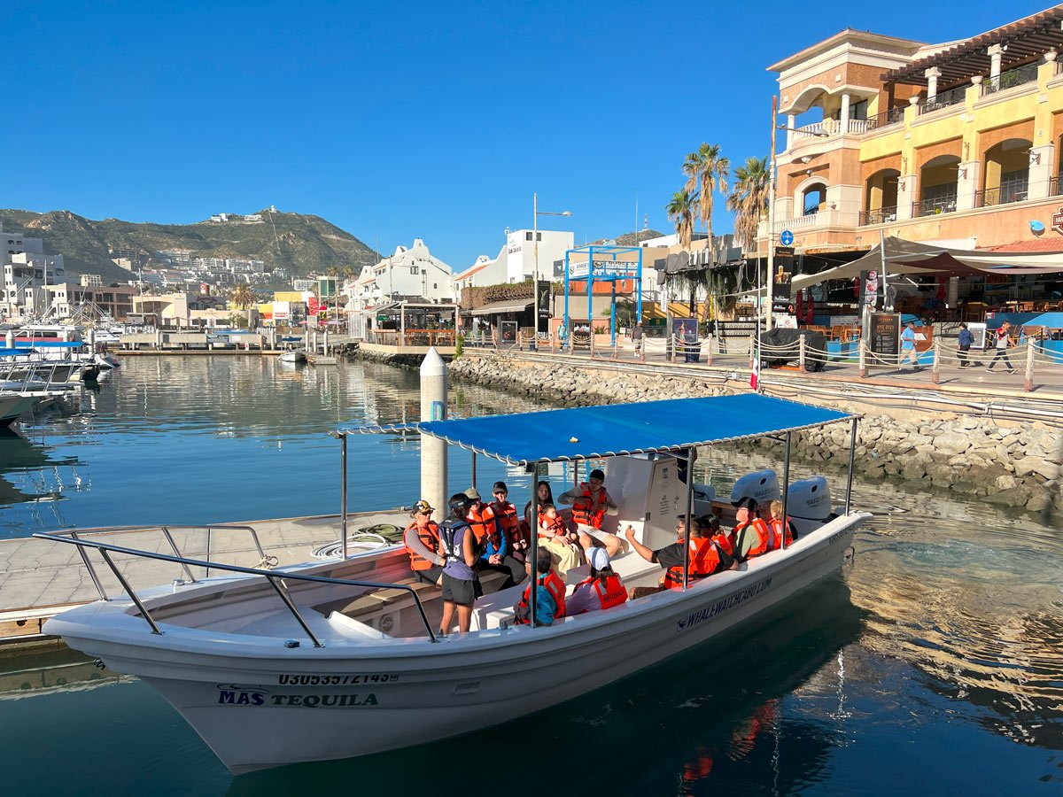 A water taxi boat leaving the Cabo San Lucas Marina