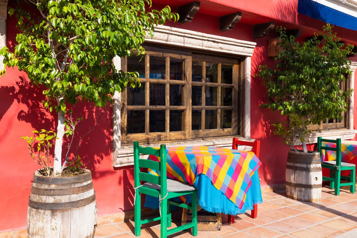 Colorful table and chairs at a Mexican restaurant in Cabo San Lucas