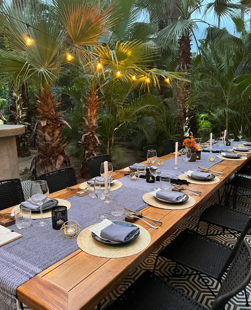 Private dining spot in the trees at Acre Restaurant, Cabo