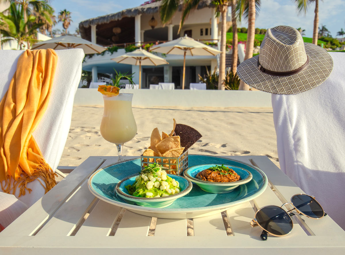 Snacks and cocktails on the beach at Encanto, Los Cabos