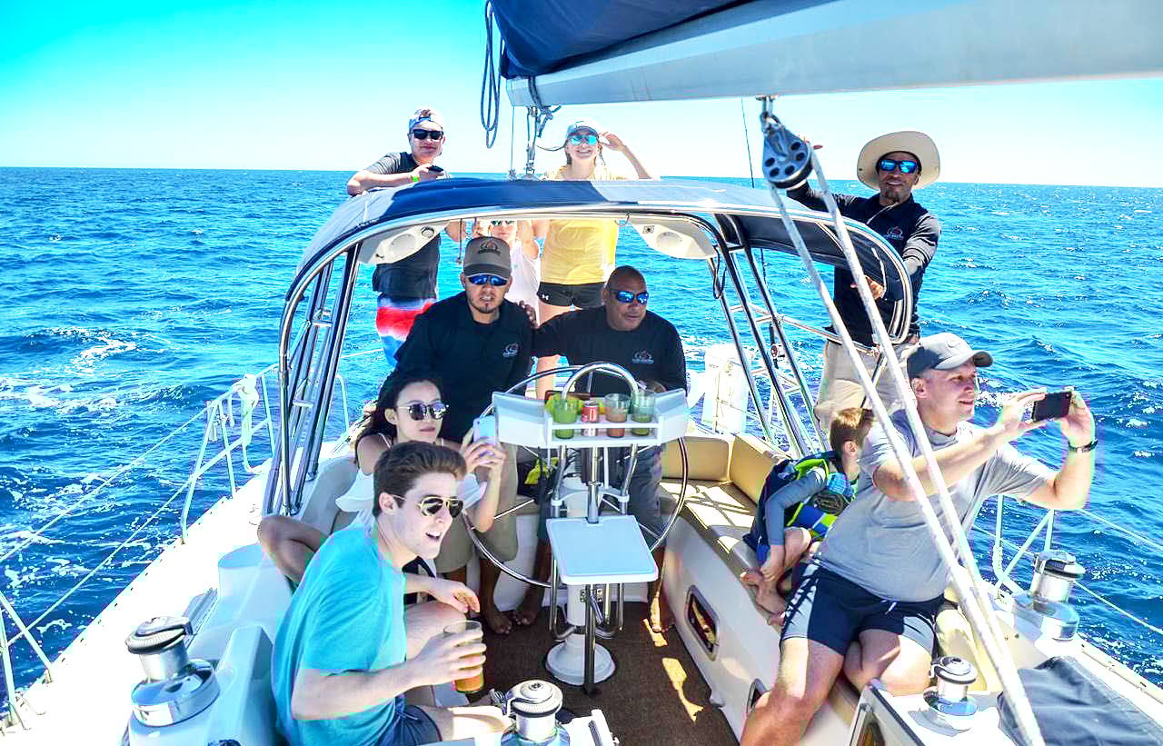 Visitors on a sailboat in Cabo San Lucas