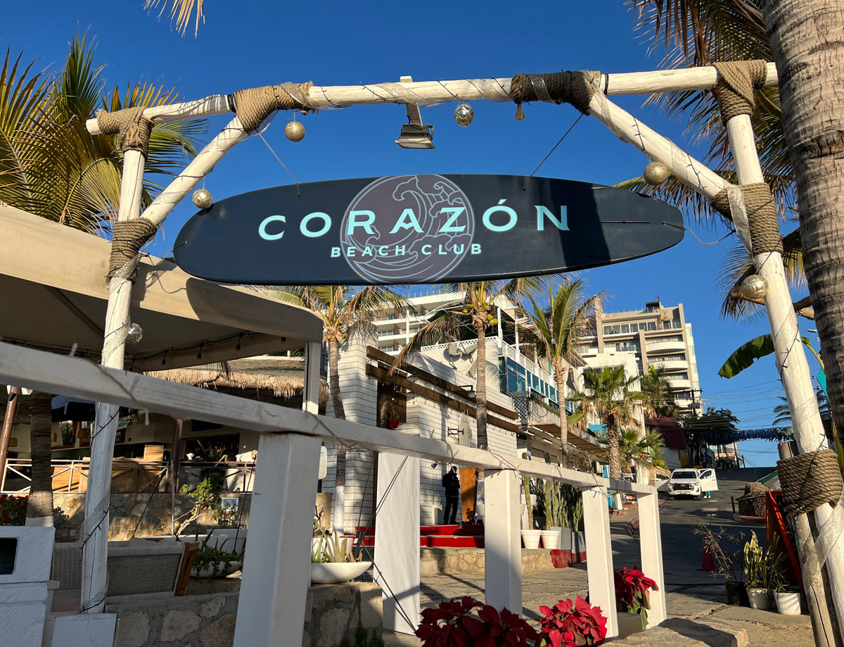 Entrance sign for Corazon Beach Club in Cabo San Lucas