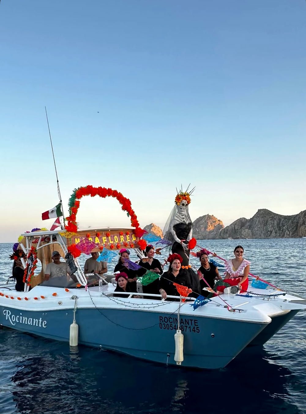 Colorfully decorated boat at the Altars at Sea festival for Day of the Dead in Cabo San Lucas