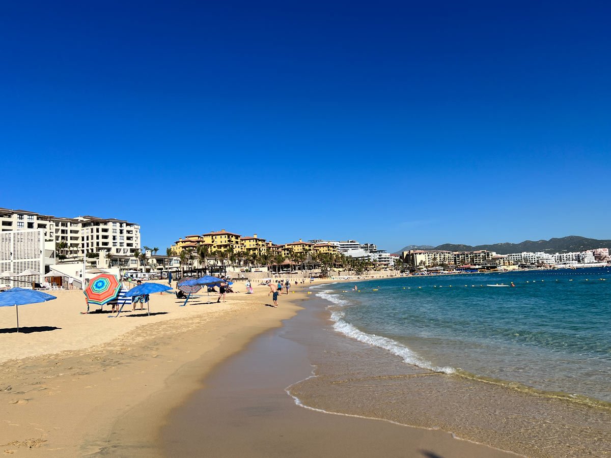 People swimming and enjoying Medano Beach