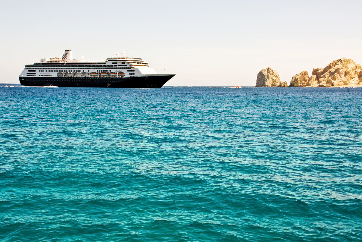 A cruise ship anchored in the Cabo San Lucas Bay