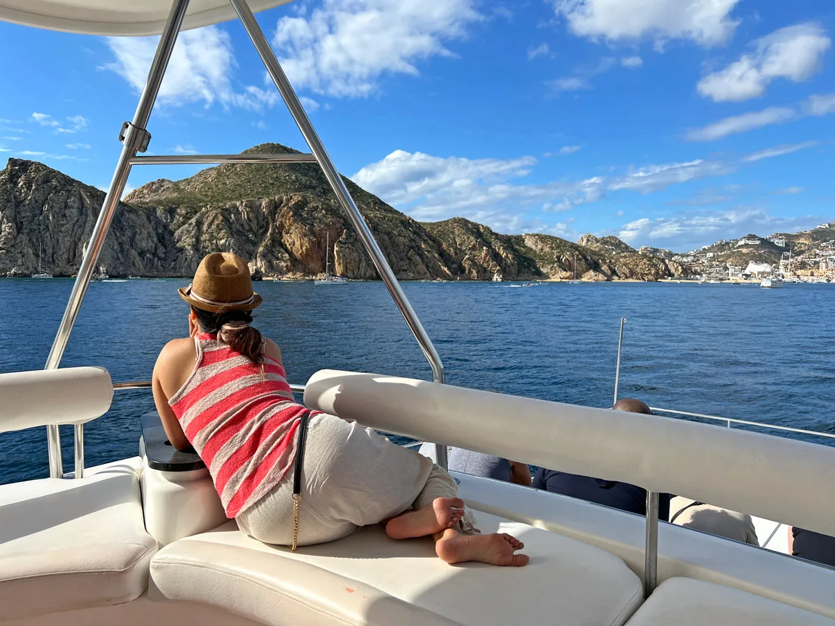 Woman on a luxury vessel, whale watching in Cabo San Lucas
