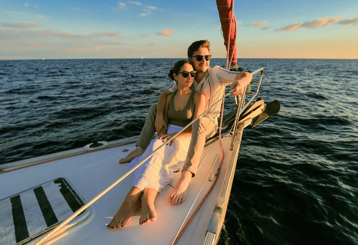 Couple on a sunset sailing trip in Cabo