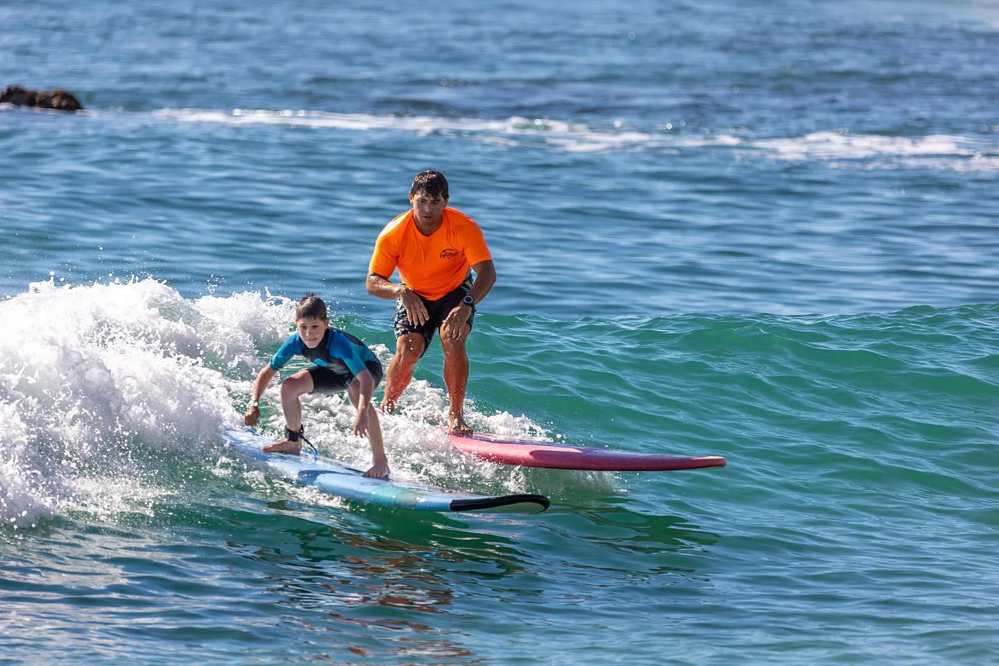 Learning to surf at Costa Azul Beach