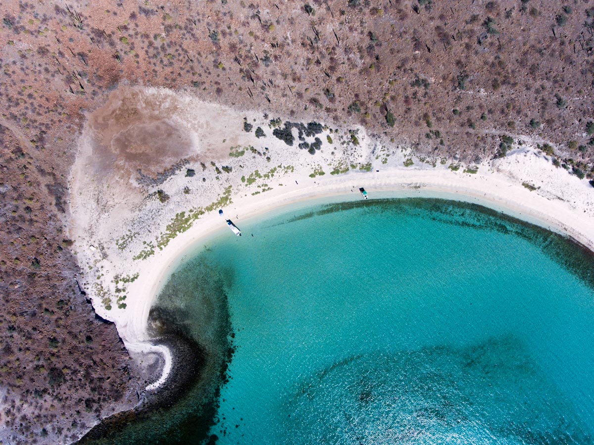 Balandra Bay is a stunning turquoise bay near La Paz, famous for its calm shallow waters and white sand beaches.