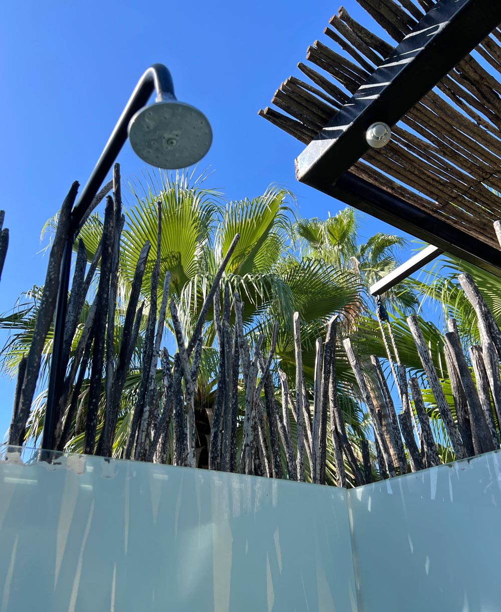 Outdoor shower at an Acre treehouse