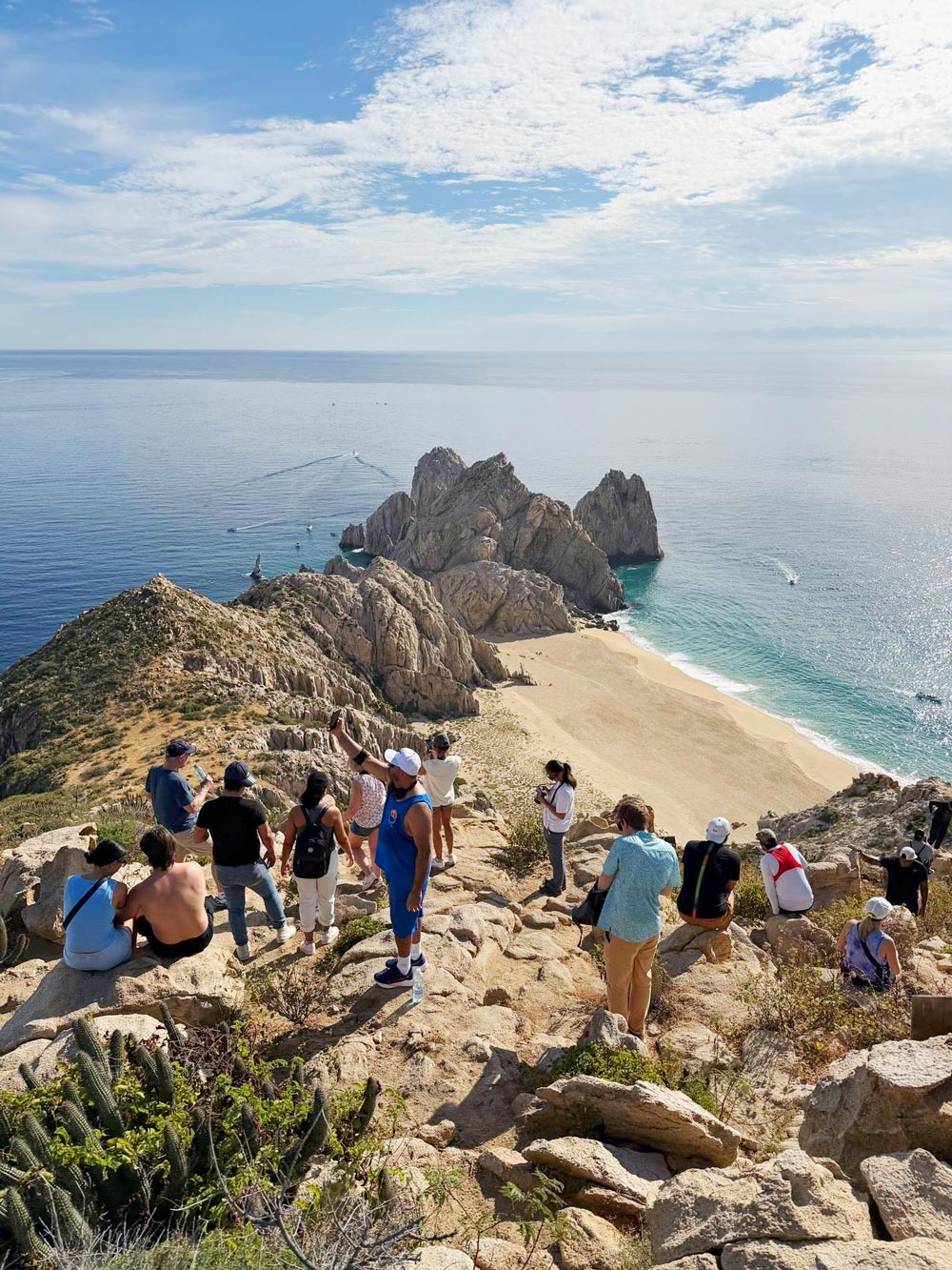 Hikers view Divorce Beach from the top of Mt. Solmar